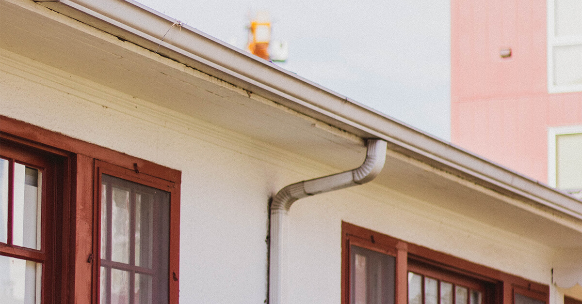 How To Clean Gutter Downspouts The Homeowner's Guide